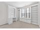 Bright office space with custom built-in bookshelves and a window seat at 1400 Basley St, Wake Forest, NC 27587