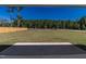 Spacious backyard with wooden fence and grassy area at 16 Sourgum Ct Ct, Zebulon, NC 27597