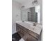 Bathroom boasts a double vanity with ample storage and elegant light fixtures at 16 Sourgum Ct Ct, Zebulon, NC 27597