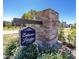 Eatmon's Landing community entrance sign with stone pillars at 16 Sourgum Ct Ct, Zebulon, NC 27597