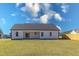 House exterior showcasing a backyard and wooden fence at 16 Sourgum Ct Ct, Zebulon, NC 27597