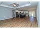 Open concept kitchen with stainless steel appliances and island at 16 Sourgum Ct Ct, Zebulon, NC 27597