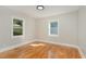 Spacious bedroom with hardwood floors and sunlight at 1712 Rosetta Dr, Durham, NC 27701