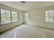 Sun-filled room with ample natural light from three large windows at 1725 Burnette Garden Path, Raleigh, NC 27612