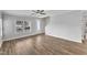 Open living space with hardwood floors and access to the front entrance at 201 Brickwell Way, Youngsville, NC 27596