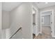 Upstairs hallway with access to bedrooms and a bathroom at 201 Brickwell Way, Youngsville, NC 27596