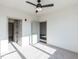 Well-lit bedroom with carpet flooring and ceiling fan at 2325 Gathering Square Ct Ct # 2325, Fuquay Varina, NC 27526