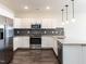 Modern kitchen with stainless steel appliances and granite countertops at 2325 Gathering Square Ct Ct # 2325, Fuquay Varina, NC 27526
