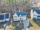 Two-story house aerial view, driveway, and yard at 2901 Alder Ridge Ln, Raleigh, NC 27603