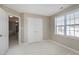 Bedroom with carpeted floors, natural light and a closet at 2901 Alder Ridge Ln, Raleigh, NC 27603