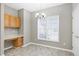 Bright breakfast nook with built-in desk and large window at 2901 Alder Ridge Ln, Raleigh, NC 27603