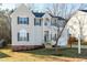 Charming two-story home with neutral siding, black shutters, and an attached two-car garage at 2901 Alder Ridge Ln, Raleigh, NC 27603
