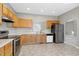 Modern kitchen with stainless steel appliances and ample counter space at 2901 Alder Ridge Ln, Raleigh, NC 27603