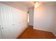 Spacious bedroom with ample closet space and hardwood floors at 315 Lakeshore Dr, Hillsborough, NC 27278