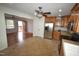 Eat-in kitchen with stainless steel appliances and view of living room at 315 Lakeshore Dr, Hillsborough, NC 27278