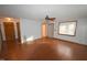Spacious living room featuring hardwood floors and neutral walls at 315 Lakeshore Dr, Hillsborough, NC 27278