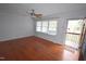 Living room with hardwood floors and access to a deck at 315 Lakeshore Dr, Hillsborough, NC 27278
