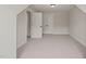 Bedroom with soft carpeting, two closets, and natural lighting at 320 Pilot Ridge Rd, Zebulon, NC 27597