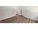 Bedroom with wood-look floors features a hallway view and closet for all your storage needs at 320 Pilot Ridge Rd, Zebulon, NC 27597