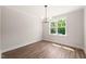 The dining room features a light fixture and a window that looks out to the yard at 320 Pilot Ridge Rd, Zebulon, NC 27597