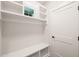 This mud room features built-in shelving and a bench with a door at 320 Pilot Ridge Rd, Zebulon, NC 27597