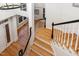 View of a two-story home's grand staircase at 3204 Nimich Pond Way, Raleigh, NC 27613