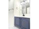 Stylish bathroom vanity with white countertop and black fixtures and modern lighting at 4541 Hershey Ct, Raleigh, NC 27613