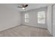Bright bedroom featuring neutral walls, carpet, and a ceiling fan at 4541 Hershey Ct, Raleigh, NC 27613