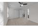 This bedroom has neutral colored carpet with access to a full bathroom at 4541 Hershey Ct, Raleigh, NC 27613
