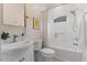 Clean bathroom with shower/tub combo and window at 504 Branch St, Raleigh, NC 27601