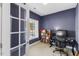 Home office with built-in shelving and window at 504 Branch St, Raleigh, NC 27601