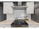 Sleek kitchen features a gas cooktop and white subway tile backsplash at 504 Branch St, Raleigh, NC 27601