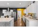 Modern kitchen with white cabinets, stainless steel appliances and quartz countertops at 504 Branch St, Raleigh, NC 27601