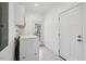 Laundry room with washer, dryer, and exterior access at 504 Branch St, Raleigh, NC 27601