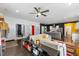 Open living room with a large sectional sofa and access to the kitchen at 504 Branch St, Raleigh, NC 27601