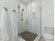 Bathroom with walk-in shower and pebble floor at 504 Branch St, Raleigh, NC 27601