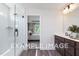 Bathroom with walk-in shower and double vanity at 53 Priming Way, Angier, NC 27501
