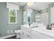 Double vanity bathroom with a shower and toilet at 53 Priming Way, Angier, NC 27501