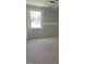 Unfinished bedroom with a window overlooking a treed lot; customizable to your tastes at 53 Priming Way, Angier, NC 27501