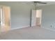 Spacious bedroom with plush carpeting and soft, natural light at 53 Priming Way, Angier, NC 27501