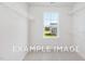 Walk-in closet with wire shelving and window at 53 Priming Way, Angier, NC 27501