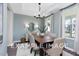 Formal dining room with a wooden table and light walls at 53 Priming Way, Angier, NC 27501
