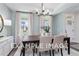 Formal dining room with a wooden table and light walls at 53 Priming Way, Angier, NC 27501