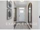 Bright entryway with wood-look floors and a large mirror at 53 Priming Way, Angier, NC 27501