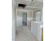 Hallway view showcasing the home's layout with doorway, leading to other rooms, awaiting final touches at 53 Priming Way, Angier, NC 27501