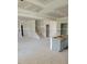 Large open-concept living space with unfinished walls, floors, and staircase ready for customization at 53 Priming Way, Angier, NC 27501