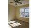 Bright bedroom with ceiling fan and large windows at 5409 Crescentview Pkwy, Raleigh, NC 27606