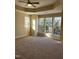 Main bedroom with carpet and multiple windows at 5409 Crescentview Pkwy, Raleigh, NC 27606