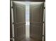 Double doors leading into a bedroom at 5409 Crescentview Pkwy, Raleigh, NC 27606