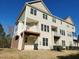 Townhouse exterior with balcony and backyard at 5409 Crescentview Pkwy, Raleigh, NC 27606